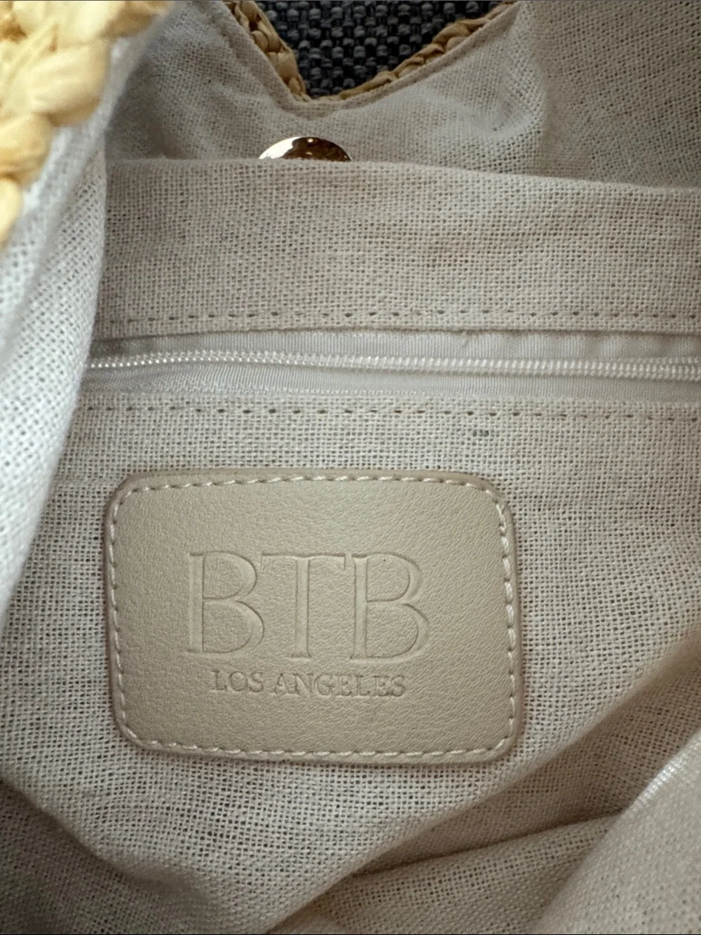 Roomy Raffia tote with lined interior.